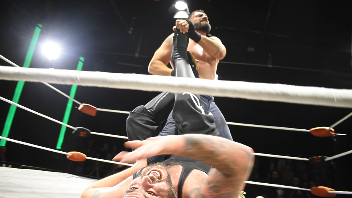 Peris try to submit Butcher