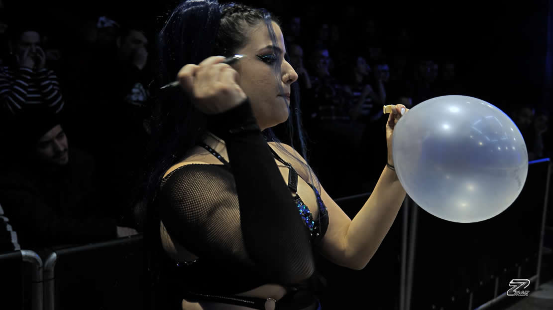 Amelia blows ballon